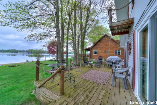 2551 Mayo Dr, Fremont, MI 49412 - wooden deck with a water view, a lawn, and area for grilling