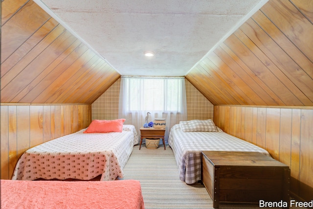 2551 Mayo Dr, Fremont, MI 49412 - carpeted bedroom featuring wood walls and vaulted ceiling