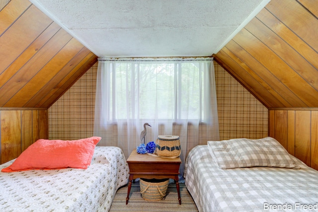 2551 Mayo Dr, Fremont, MI 49412 - bedroom featuring multiple windows, lofted ceiling, and wood walls