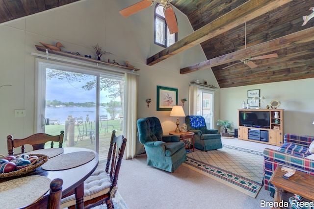 2551 Mayo Dr, Fremont, MI 49412 - carpeted living room with a ceiling fan, healthy amount of natural light, wooden ceiling, a water view, and beam ceiling