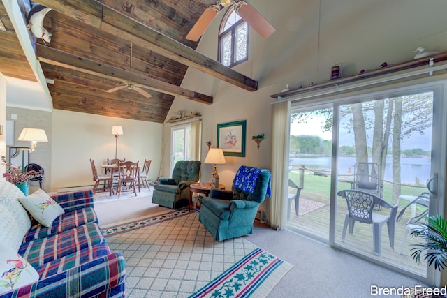 2551 Mayo Dr, Fremont, MI 49412 - living area featuring ceiling fan, a water view, high vaulted ceiling, and carpet flooring