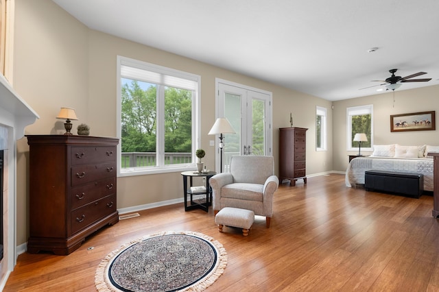 bedroom featuring light wood-type flooring and baseboards