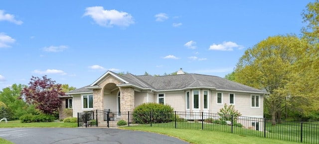 single story home with stone siding