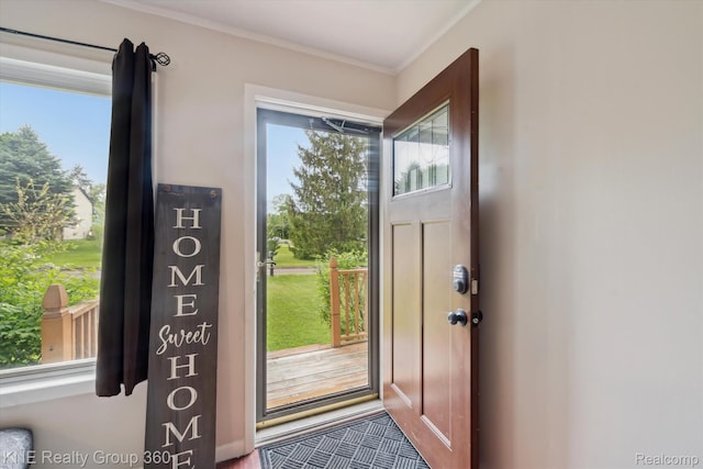 5170 Warmbriar Dr, White Lake, MI 48383 - doorway to outside with crown molding
