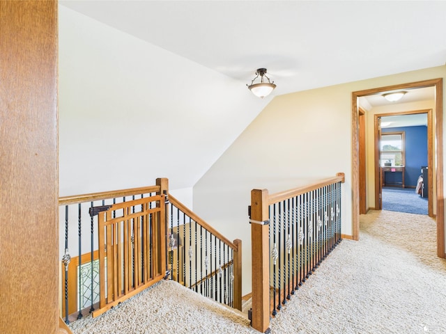 5015 Piehl Rd, Ottawa Lake, MI 49267 - stairs with carpet floors, vaulted ceiling, and baseboards