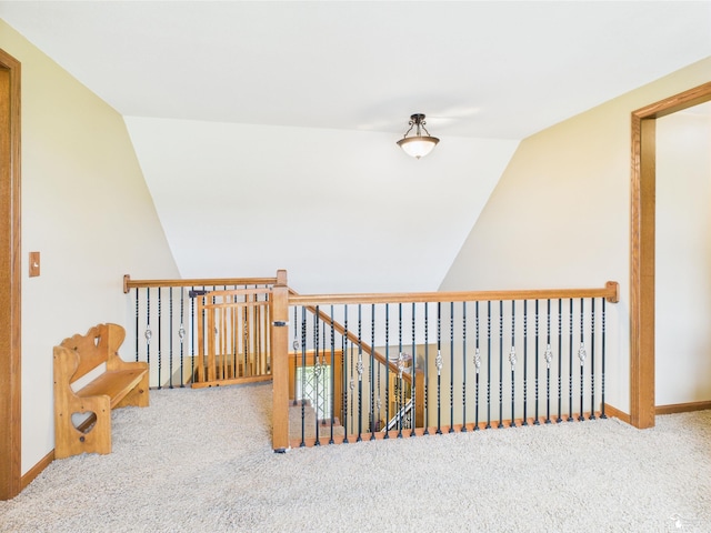 5015 Piehl Rd, Ottawa Lake, MI 49267 - corridor featuring lofted ceiling, carpet, and baseboards