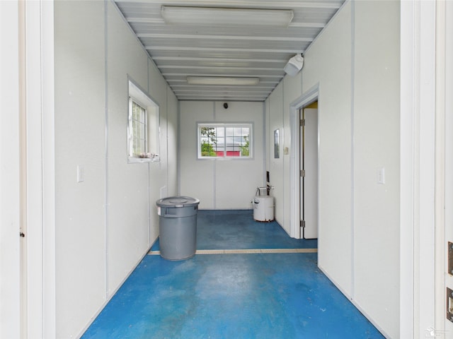 5015 Piehl Rd, Ottawa Lake, MI 49267 - hallway with finished concrete flooring