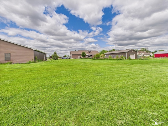 5015 Piehl Rd, Ottawa Lake, MI 49267 - view of green lawn featuring an outdoor structure