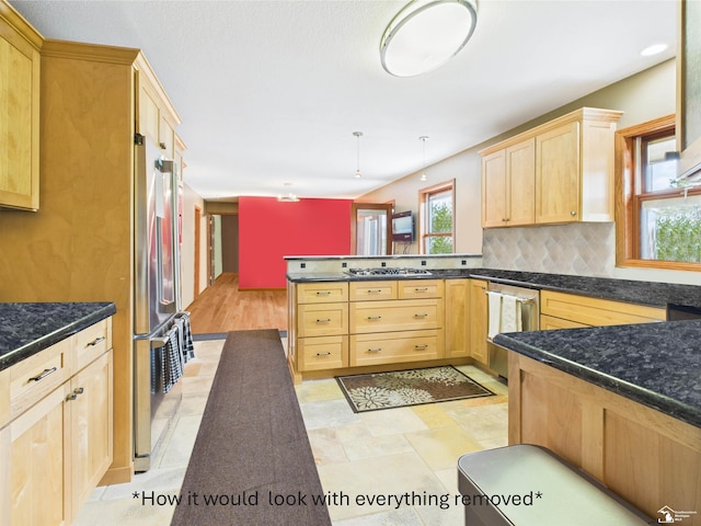 5015 Piehl Rd, Ottawa Lake, MI 49267 - kitchen with light brown cabinets, a peninsula, appliances with stainless steel finishes, and tasteful backsplash
