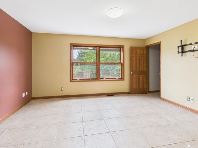 5015 Piehl Rd, Ottawa Lake, MI 49267 - spare room with light tile patterned flooring and baseboards