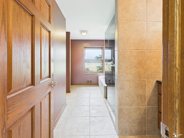 5015 Piehl Rd, Ottawa Lake, MI 49267 - bathroom featuring baseboards and tile patterned flooring