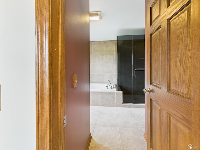 5015 Piehl Rd, Ottawa Lake, MI 49267 - bathroom featuring tile patterned flooring and a garden tub