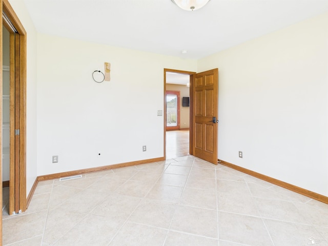 5015 Piehl Rd, Ottawa Lake, MI 49267 - unfurnished room with light tile patterned floors and baseboards