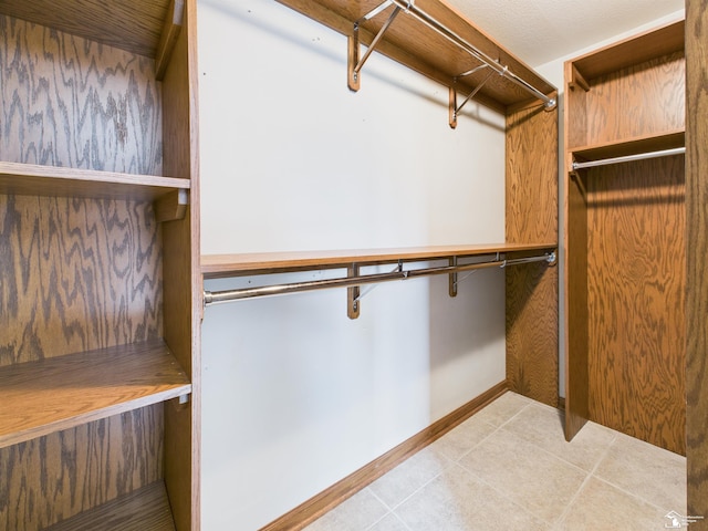 5015 Piehl Rd, Ottawa Lake, MI 49267 - walk in closet with light tile patterned floors