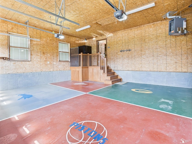 5015 Piehl Rd, Ottawa Lake, MI 49267 - garage with a garage door opener and a heating unit