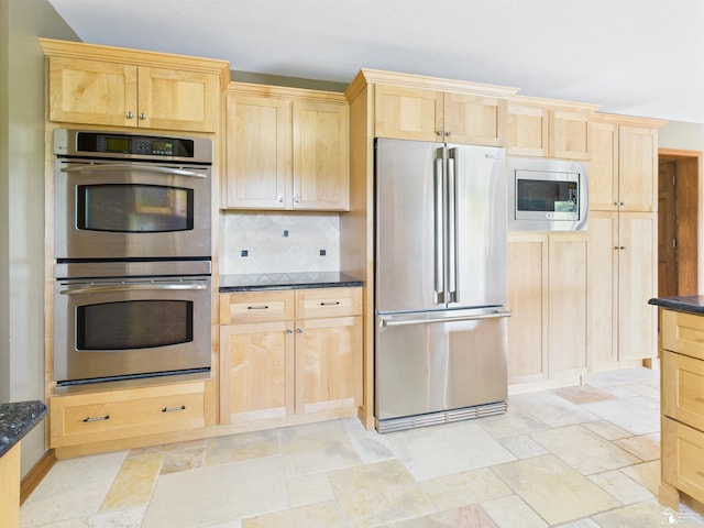 5015 Piehl Rd, Ottawa Lake, MI 49267 - kitchen featuring stainless steel appliances, light brown cabinets, and light stone finish flooring