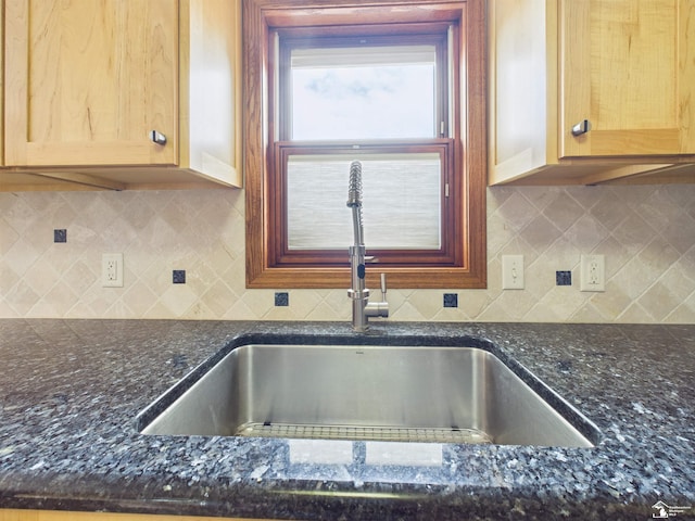 5015 Piehl Rd, Ottawa Lake, MI 49267 - kitchen featuring dark stone counters and decorative backsplash