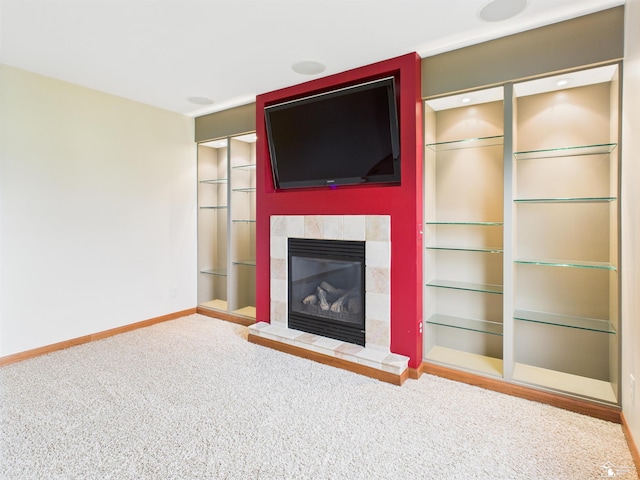 5015 Piehl Rd, Ottawa Lake, MI 49267 - unfurnished living room with a tile fireplace and carpet
