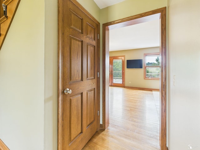 5015 Piehl Rd, Ottawa Lake, MI 49267 - hallway featuring light wood-type flooring and baseboards