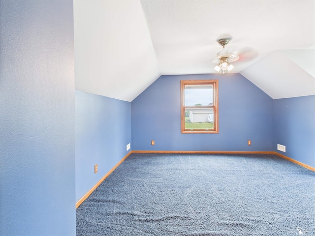 5015 Piehl Rd, Ottawa Lake, MI 49267 - additional living space with a ceiling fan, carpet, and vaulted ceiling