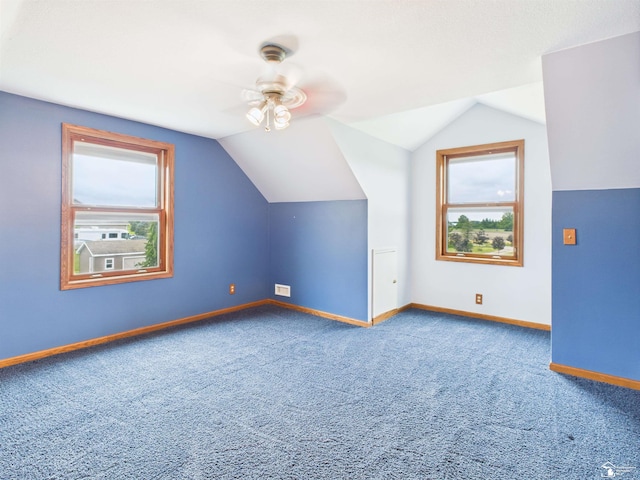 5015 Piehl Rd, Ottawa Lake, MI 49267 - additional living space with lofted ceiling, carpet, and a ceiling fan