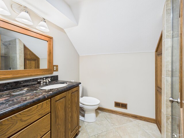 5015 Piehl Rd, Ottawa Lake, MI 49267 - full bath with vaulted ceiling, vanity, tiled shower, and tile patterned floors