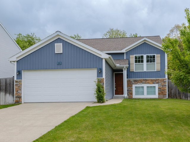 view of front of home featuring stone siding, a shingled roof, driveway, and board and batten siding