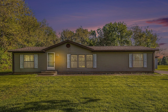 115 E X Y Ave, Vicksburg, MI 49097 - ranch-style house featuring a lawn and a shingled roof