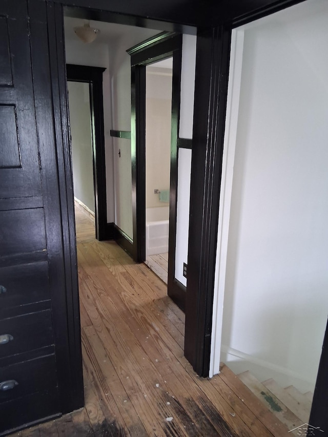 908 Lansing Ave, Jackson, MI 49202 - corridor featuring hardwood / wood-style flooring