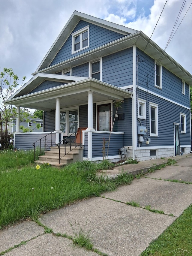 908 Lansing Ave, Jackson, MI 49202 - traditional style home with a porch