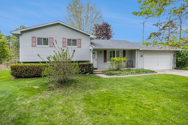 tri-level home with an attached garage, concrete driveway, a front lawn, and a shingled roof