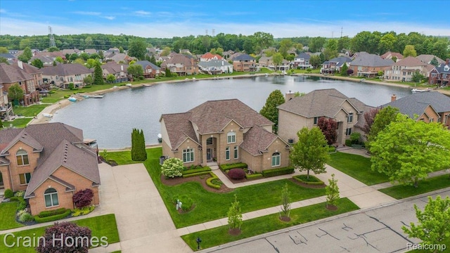 49729 Sandra Dr, Shelby Twp, MI 48315 - aerial view of residential area with a large body of water