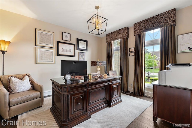 49729 Sandra Dr, Shelby Twp, MI 48315 - office featuring a chandelier, baseboards, and light wood-style flooring
