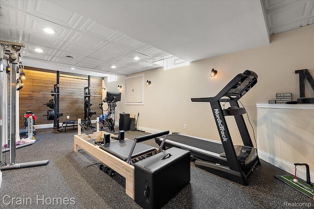 49729 Sandra Dr, Shelby Twp, MI 48315 - workout area featuring wood walls, recessed lighting, baseboards, and an ornate ceiling