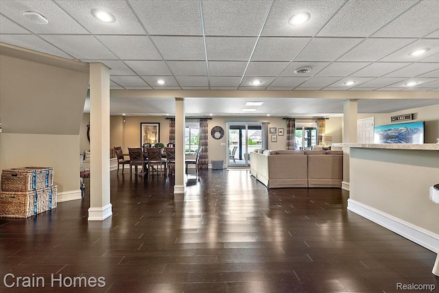 49729 Sandra Dr, Shelby Twp, MI 48315 - workout room with decorative columns, baseboards, wood finished floors, and a drop ceiling