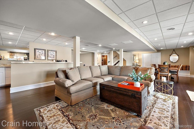 49729 Sandra Dr, Shelby Twp, MI 48315 - living area featuring a drop ceiling, dark wood-style floors, baseboards, and recessed lighting