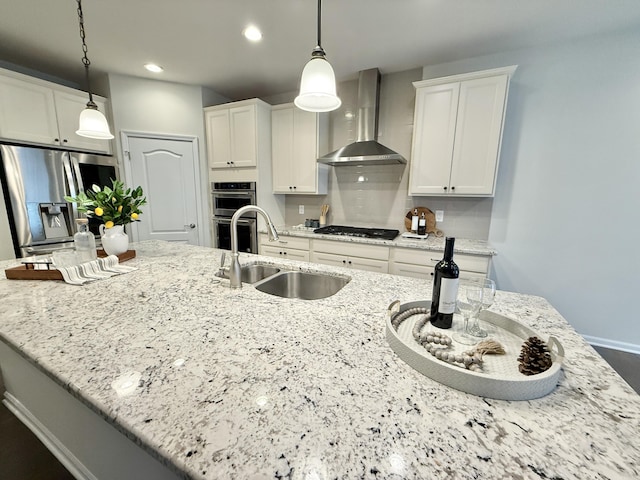 2763 Polson St, Ann Arbor, MI 48105 - kitchen with wall chimney range hood, stainless steel appliances, a sink, white cabinetry, and recessed lighting