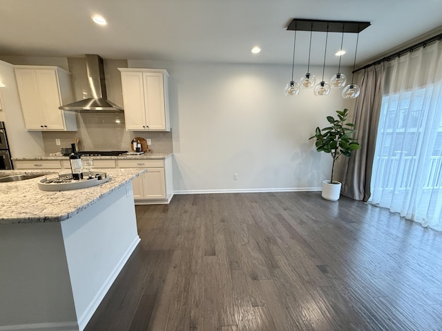 2763 Polson St, Ann Arbor, MI 48105 - kitchen featuring wall chimney exhaust hood, baseboards, dark wood-style flooring, and recessed lighting