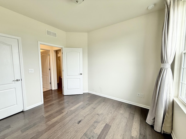 2763 Polson St, Ann Arbor, MI 48105 - unfurnished bedroom with wood finished floors and baseboards