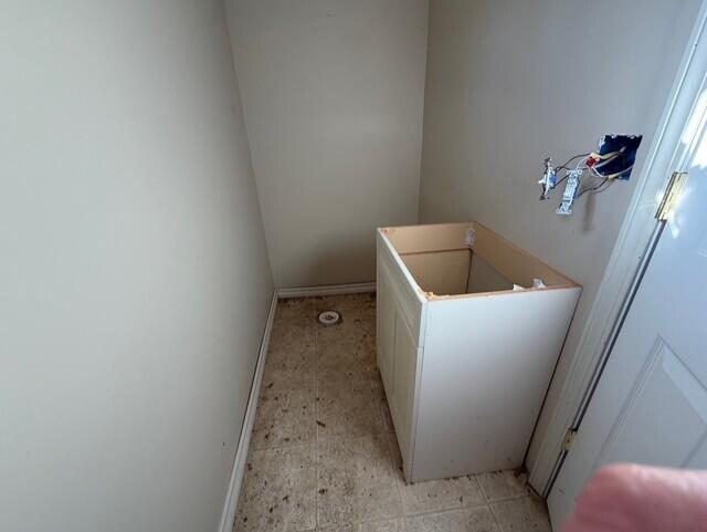 7224 County Farm Rd, Lexington, MI 48450 - washroom featuring baseboards