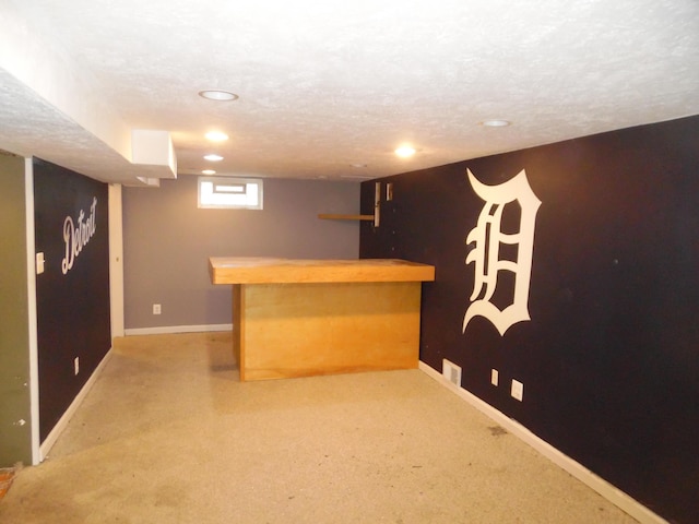 614 Allcott St, Marshall, MI 49068 - indoor dry bar featuring recessed lighting, light colored carpet, and baseboards