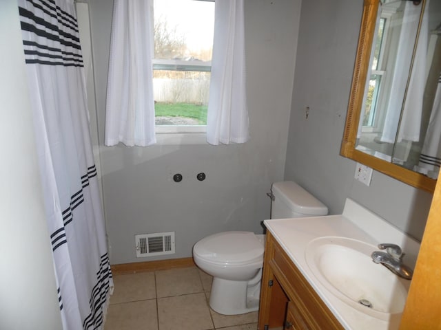 614 Allcott St, Marshall, MI 49068 - bathroom featuring toilet, tile patterned flooring, and vanity