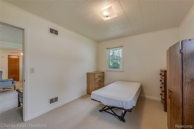 631 Lindsay St, West Branch, MI 48661 - bedroom with ornamental molding, carpet, and baseboards