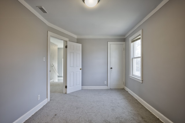 14955 Penrod St, Detroit, MI 48223 - unfurnished bedroom featuring crown molding, carpet floors, and baseboards