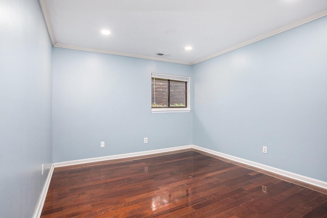 300 Briarcrest Dr Unit 141, Ann Arbor, MI 48104 - empty room featuring crown molding, baseboards, dark wood-style flooring, and recessed lighting