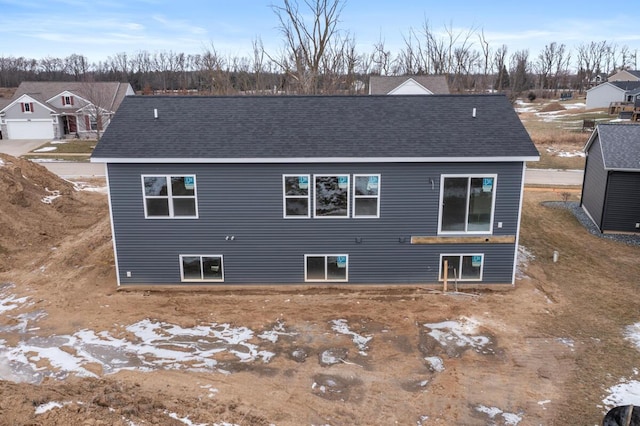 9383 Shimano Dr, Portland, MI 48875 - back of property featuring roof with shingles
