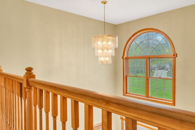 hall with a chandelier