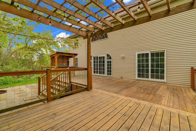 wooden terrace featuring a pergola