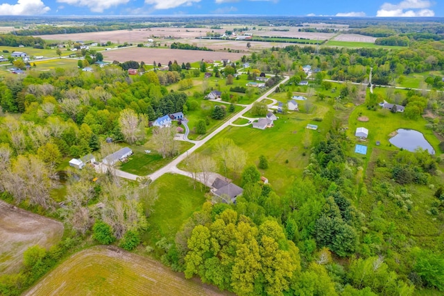 aerial view of property's location featuring a nearby body of water