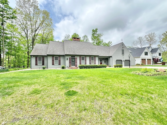 4909 Barnstable Ln, Lansing, MI 48906 - view of front of property featuring a chimney, a front lawn, and roof with shingles